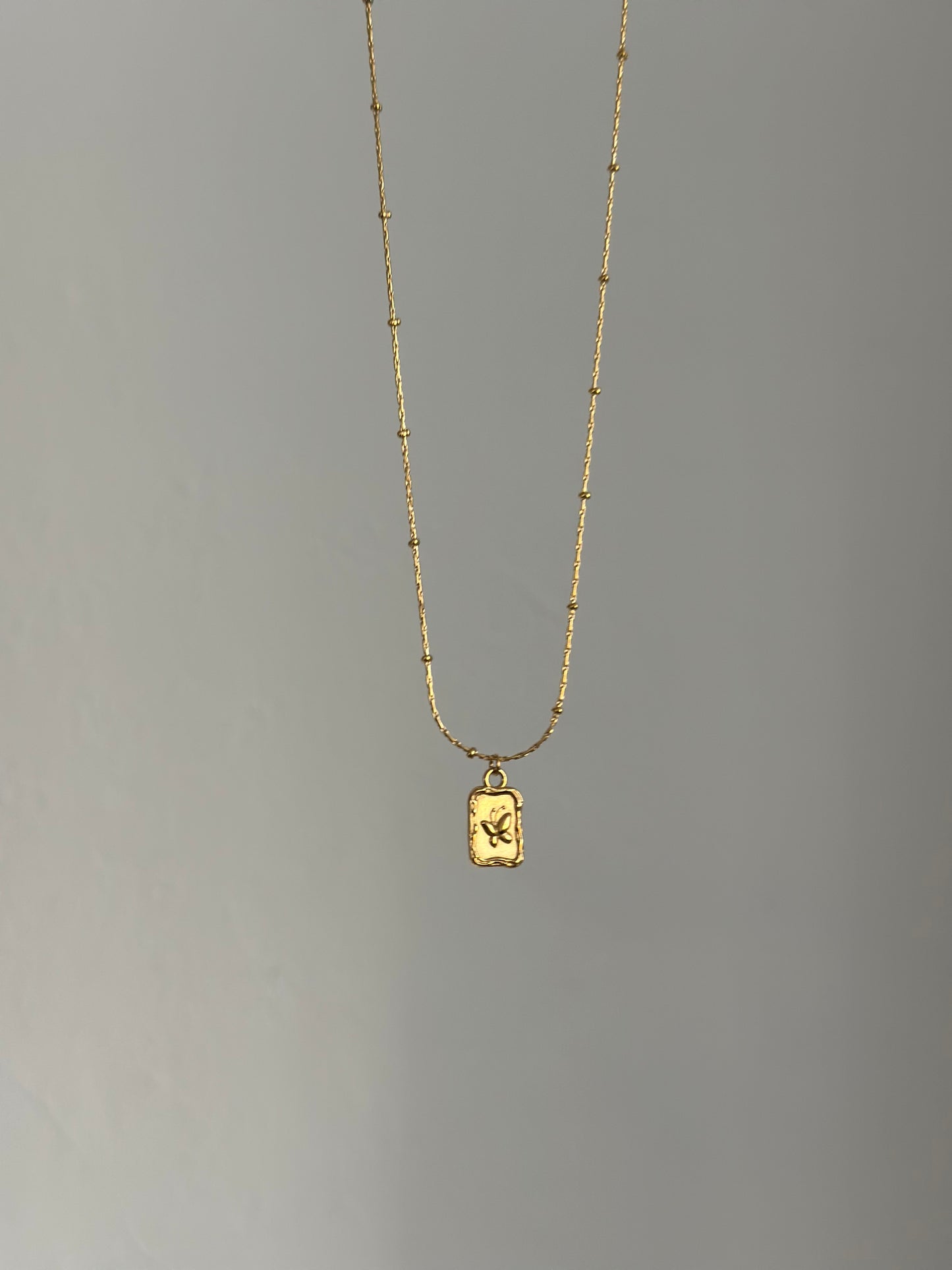 Simple butterfly necklace